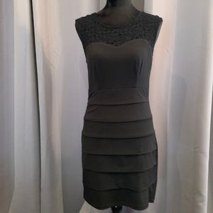 Sexy sleeveless black dress with lace top from SWEET STORM. Size Large.